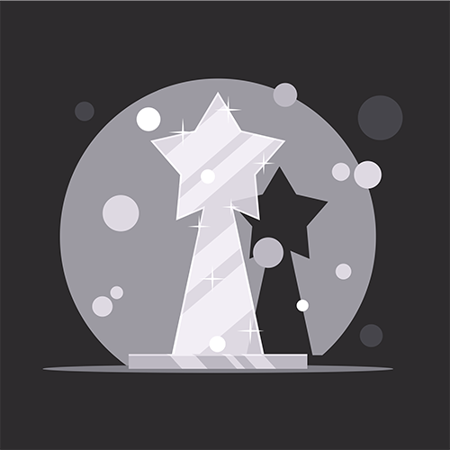 A shiny star-shaped trophy on a dark background.