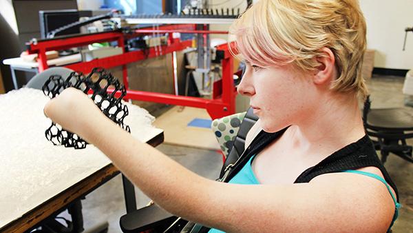 A woman holding an object
